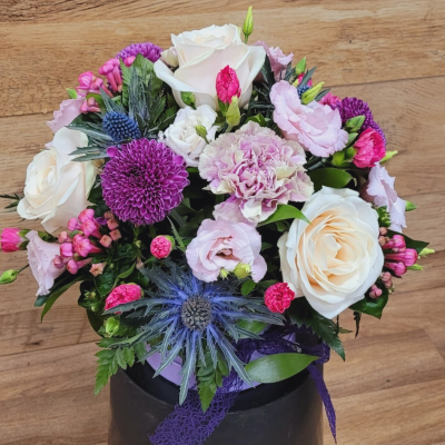 Secret Whispers - This luxury arrangement of flowers in a stylish Hat Box will be remembered for a long time!