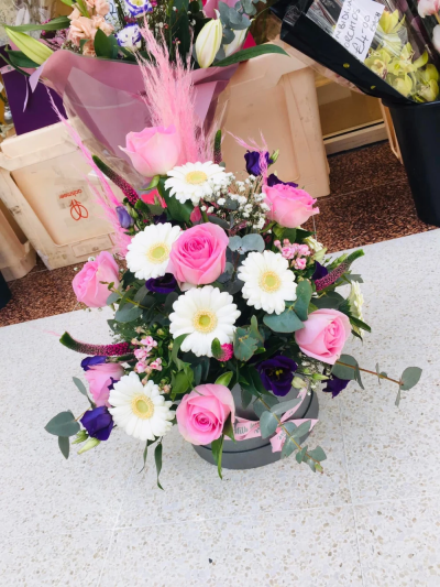 Pretty pinks - Beautiful pink hatbox arrangement